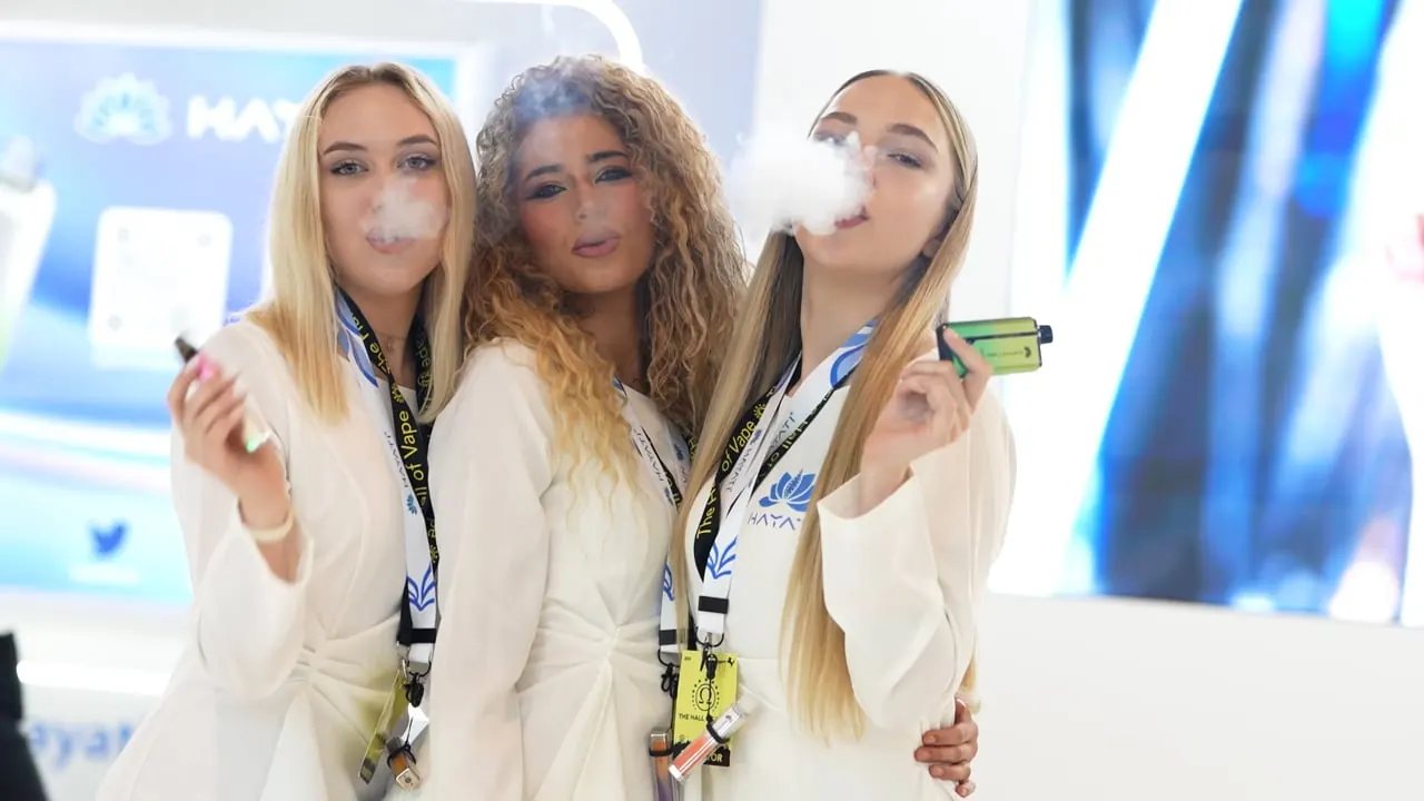 Brand ambassadors at a trade show booth